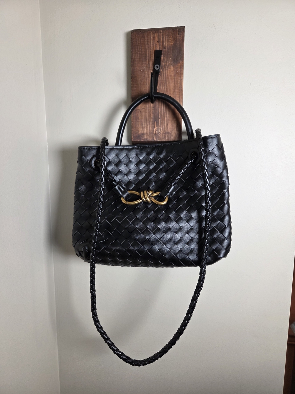 Black Woven Handbag Braided Handles Gold Knot Detail Pink Lining